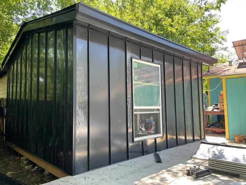 Black standing seam metal wall panels for Metal Roof Installation in New Rochelle