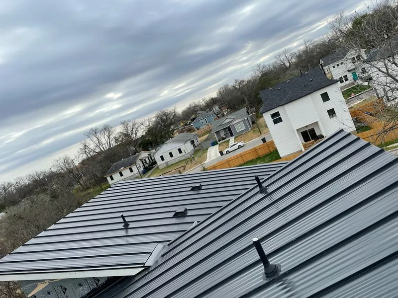 Standing seam metal roof panels with vents for Skylight Repair in New Rochelle